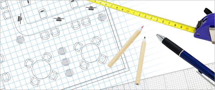 店舗平面図でレイアウトを考えているイメージ画像
